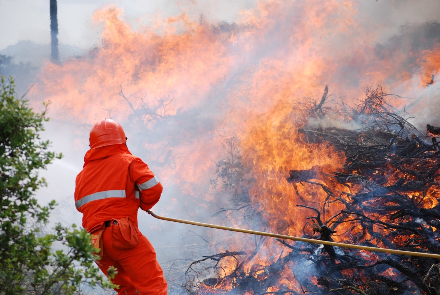 fireman extinguishes fire