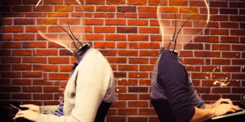 Selection of ideas two men with light bulb shaped head