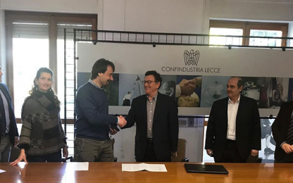 Konfindustria Shquiptare Agreement handshake