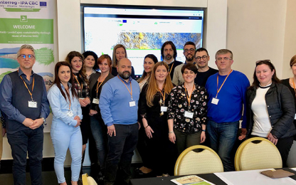 Intermediate Meeting of the project WELCOME people at a meeting taking a picture