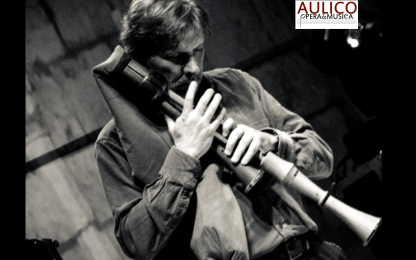 musician plays zampogna