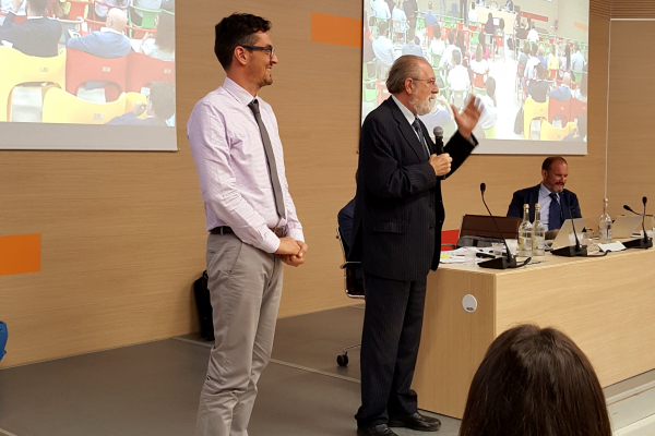 Man talking to audience during the seminar