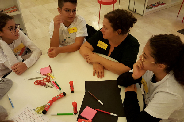 children sitting around a table