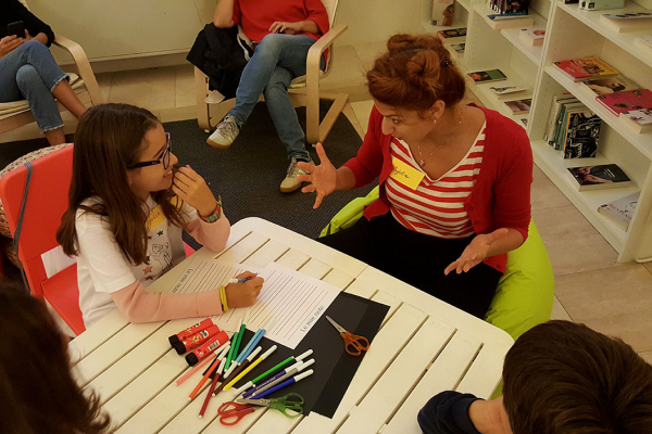 woman talking with children